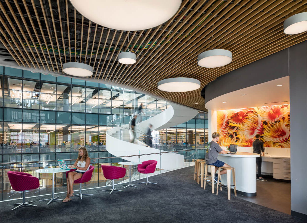 Collaborative office space with lounge chairs and shared work surfaces Event Furniture Rental